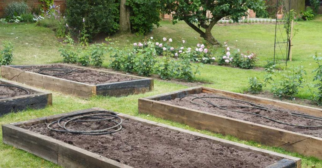 can you put a raised garden bed on grass